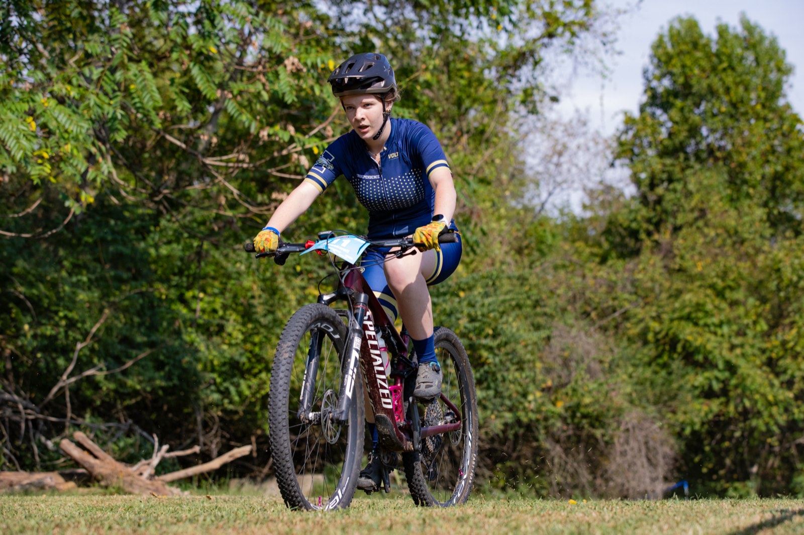 Rider cruising an open field section of the course