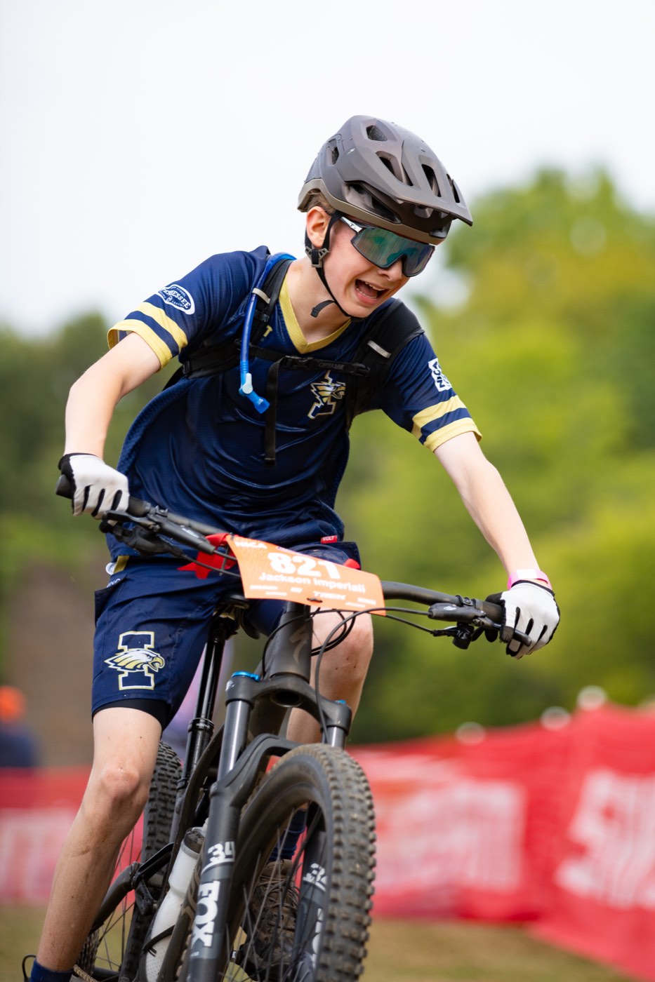 Rider gritting through a race climb