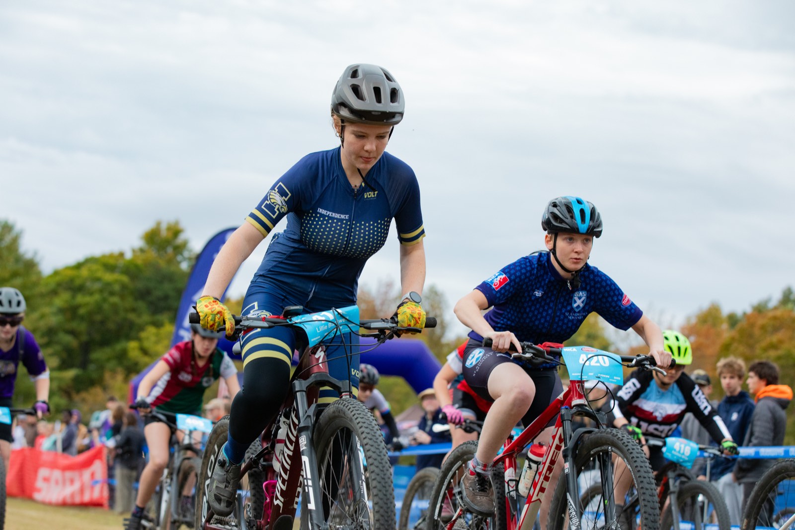Two riders battling off the start line