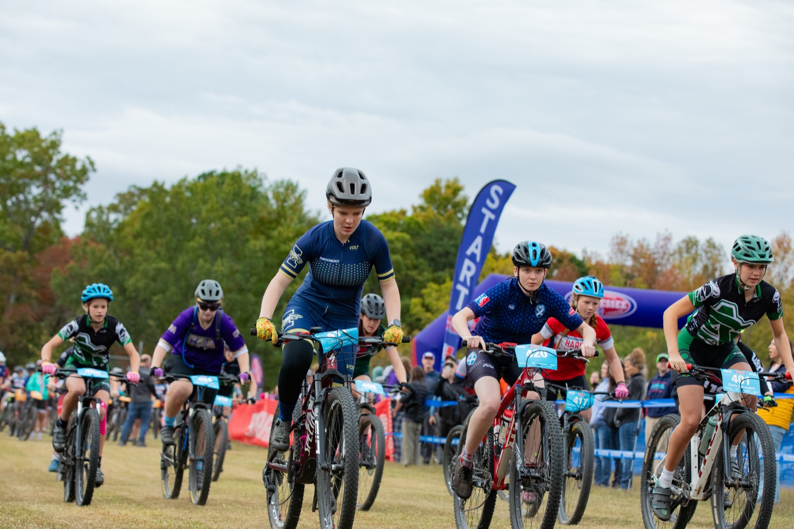 Riders sprinting off the start line at a Tennessee League race
